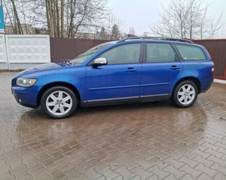 Синий Вольво В50, объемом двигателя 2.4 л и пробегом 283 тыс. км за 6950 $, фото 2 на Automoto.ua