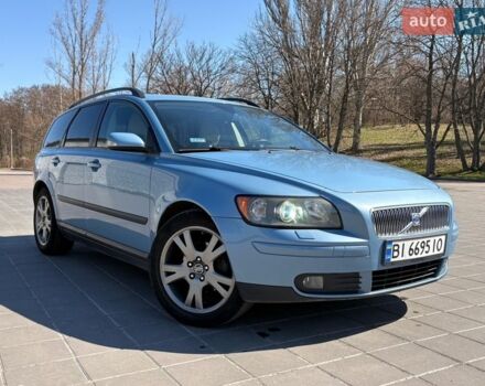 Синий Вольво В50, объемом двигателя 1.8 л и пробегом 313 тыс. км за 5000 $, фото 1 на Automoto.ua