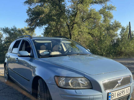Синий Вольво В50, объемом двигателя 1.8 л и пробегом 305 тыс. км за 7000 $, фото 1 на Automoto.ua