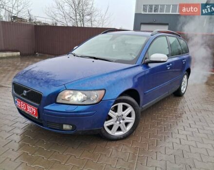 Синий Вольво В50, объемом двигателя 2.4 л и пробегом 283 тыс. км за 8700 $, фото 1 на Automoto.ua