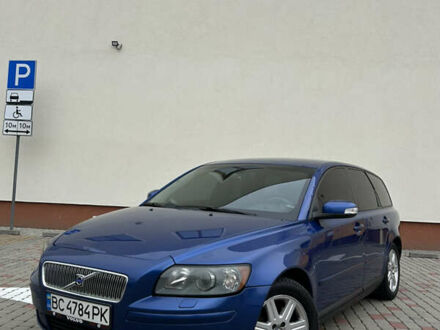 Синій Вольво V50, об'ємом двигуна 2 л та пробігом 344 тис. км за 7499 $, фото 1 на Automoto.ua