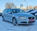 Сірий Вольво V70, об'ємом двигуна 2 л та пробігом 250 тис. км за 13999 $, фото 1 на Automoto.ua
