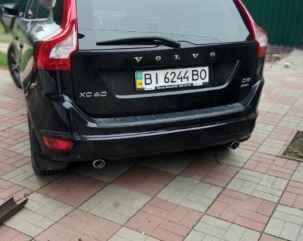 Черный Вольво ХС60, объемом двигателя 2.4 л и пробегом 102 тыс. км за 20000 $, фото 1 на Automoto.ua