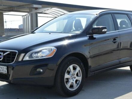 Черный Вольво ХС60, объемом двигателя 2.4 л и пробегом 334 тыс. км за 9983 $, фото 1 на Automoto.ua