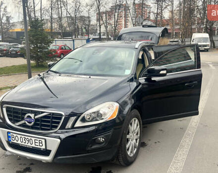 Черный Вольво ХС60, объемом двигателя 2.4 л и пробегом 290 тыс. км за 13999 $, фото 1 на Automoto.ua