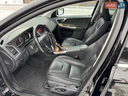 Черный Вольво ХС60, объемом двигателя 2 л и пробегом 136 тыс. км за 16999 $, фото 1 на Automoto.ua