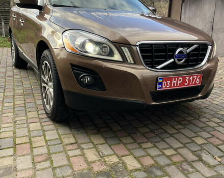 Коричневый Вольво ХС60, объемом двигателя 2.4 л и пробегом 197 тыс. км за 12777 $, фото 1 на Automoto.ua