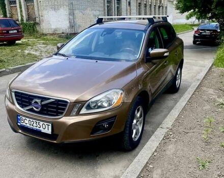 Коричневий Вольво ХС60, об'ємом двигуна 2.4 л та пробігом 325 тис. км за 10999 $, фото 1 на Automoto.ua