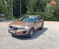 Коричневый Вольво ХС60, объемом двигателя 2.4 л и пробегом 295 тыс. км за 14800 $, фото 1 на Automoto.ua
