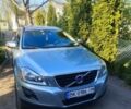 Серый Вольво ХС60, объемом двигателя 2.4 л и пробегом 294 тыс. км за 13599 $, фото 1 на Automoto.ua