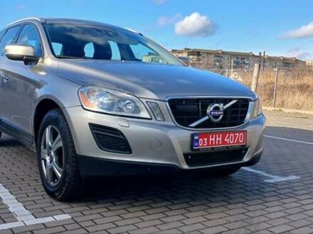 Серый Вольво ХС60, объемом двигателя 2.4 л и пробегом 285 тыс. км за 14950 $, фото 1 на Automoto.ua