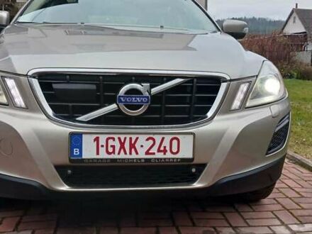 Серый Вольво ХС60, объемом двигателя 2.4 л и пробегом 285 тыс. км за 14900 $, фото 1 на Automoto.ua