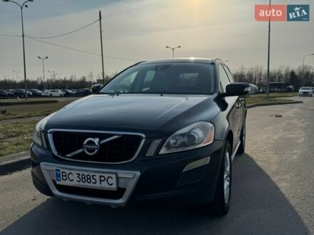Серый Вольво ХС60, объемом двигателя 2.4 л и пробегом 300 тыс. км за 13350 $, фото 1 на Automoto.ua