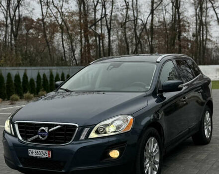 Синий Вольво ХС60, объемом двигателя 2.4 л и пробегом 240 тыс. км за 12800 $, фото 1 на Automoto.ua