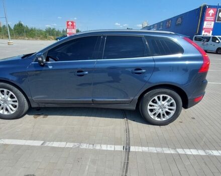 Синій Вольво ХС60, об'ємом двигуна 2 л та пробігом 380 тис. км за 7606 $, фото 1 на Automoto.ua