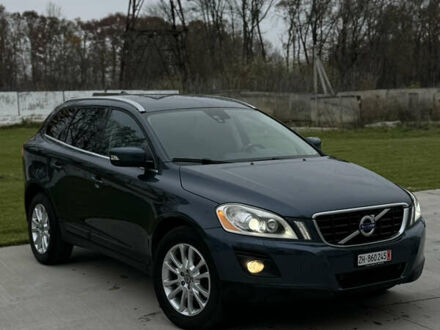 Синий Вольво ХС60, объемом двигателя 2.4 л и пробегом 240 тыс. км за 12800 $, фото 1 на Automoto.ua