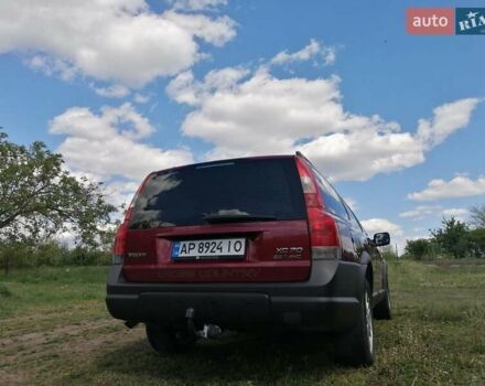 Вольво ХС70 2003 в Запорожье на Automoto.ua Красный Вольво ХС70, объемом двигателя 2.5 л и пробегом 306 тыс. км за 8000 $, фото 1 на Automoto.ua