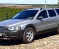 Серый Вольво ХС70, объемом двигателя 2.4 л и пробегом 326 тыс. км за 7800 $, фото 1 на Automoto.ua