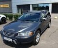 Серый Вольво ХС70, объемом двигателя 2.5 л и пробегом 336 тыс. км за 8990 $, фото 1 на Automoto.ua