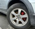 Серый Вольво ХС70, объемом двигателя 2.4 л и пробегом 280 тыс. км за 11800 $, фото 2 на Automoto.ua