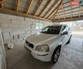 Белый Вольво ХС90, объемом двигателя 2.4 л и пробегом 298 тыс. км за 20000 $, фото 1 на Automoto.ua