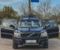 Черный Вольво ХС90, объемом двигателя 2.5 л и пробегом 330 тыс. км за 7999 $, фото 1 на Automoto.ua