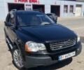 Черный Вольво ХС90, объемом двигателя 2.4 л и пробегом 320 тыс. км за 7100 $, фото 1 на Automoto.ua