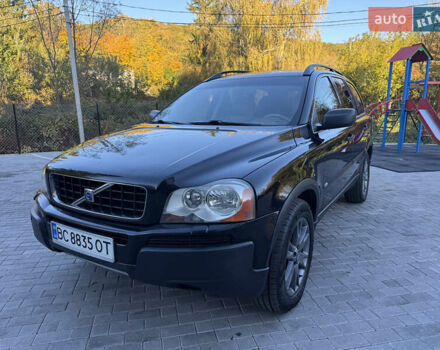 Черный Вольво ХС90, объемом двигателя 2.4 л и пробегом 570 тыс. км за 7999 $, фото 1 на Automoto.ua