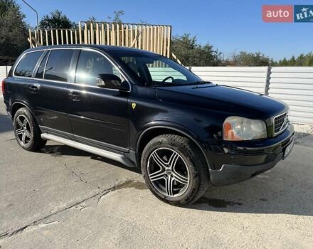 Черный Вольво ХС90, объемом двигателя 2.4 л и пробегом 320 тыс. км за 10500 $, фото 1 на Automoto.ua