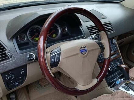 Черный Вольво ХС90, объемом двигателя 2.4 л и пробегом 317 тыс. км за 11900 $, фото 1 на Automoto.ua