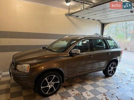 Коричневый Вольво ХС90, объемом двигателя 2.4 л и пробегом 190 тыс. км за 15500 $, фото 1 на Automoto.ua