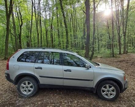 Серый Вольво ХС90, объемом двигателя 2.4 л и пробегом 320 тыс. км за 9400 $, фото 2 на Automoto.ua