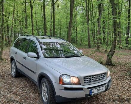 Серый Вольво ХС90, объемом двигателя 2.4 л и пробегом 320 тыс. км за 9400 $, фото 1 на Automoto.ua