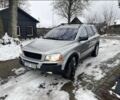 Серый Вольво ХС90, объемом двигателя 2.4 л и пробегом 249 тыс. км за 2610 $, фото 1 на Automoto.ua