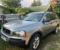 Серый Вольво ХС90, объемом двигателя 2.5 л и пробегом 230 тыс. км за 14200 $, фото 1 на Automoto.ua