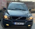 Серый Вольво ХС90, объемом двигателя 2.4 л и пробегом 247 тыс. км за 5200 $, фото 1 на Automoto.ua