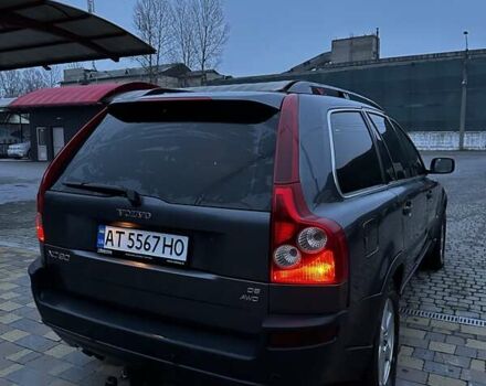 Серый Вольво ХС90, объемом двигателя 2.4 л и пробегом 402 тыс. км за 7500 $, фото 2 на Automoto.ua