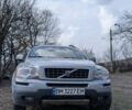 Серый Вольво ХС90, объемом двигателя 2.4 л и пробегом 353 тыс. км за 6009 $, фото 1 на Automoto.ua