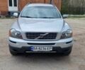 Серый Вольво ХС90, объемом двигателя 2.4 л и пробегом 273 тыс. км за 14500 $, фото 1 на Automoto.ua