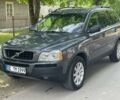Серый Вольво ХС90, объемом двигателя 2.4 л и пробегом 230 тыс. км за 2550 $, фото 1 на Automoto.ua