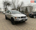 Серый Вольво ХС90, объемом двигателя 2.4 л и пробегом 215 тыс. км за 16499 $, фото 1 на Automoto.ua