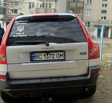 Серый Вольво ХС90, объемом двигателя 2.4 л и пробегом 385 тыс. км за 9500 $, фото 1 на Automoto.ua