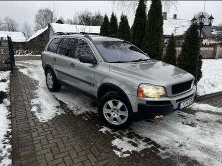 Серый Вольво ХС90, объемом двигателя 2.4 л и пробегом 249 тыс. км за 2610 $, фото 1 на Automoto.ua