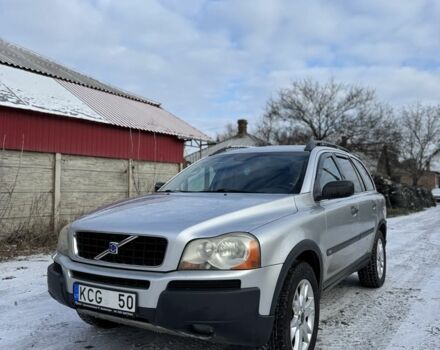 Серый Вольво ХС90, объемом двигателя 2.4 л и пробегом 30 тыс. км за 5700 $, фото 1 на Automoto.ua