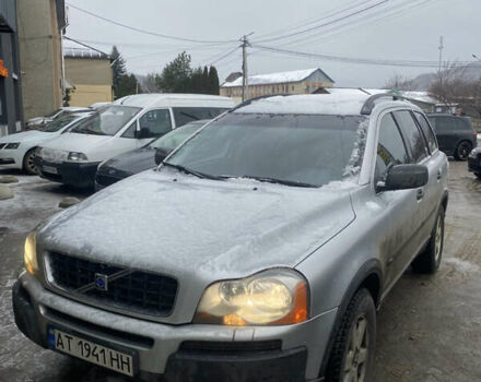 Серый Вольво ХС90, объемом двигателя 2.4 л и пробегом 220 тыс. км за 11200 $, фото 1 на Automoto.ua