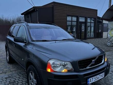 Серый Вольво ХС90, объемом двигателя 2.4 л и пробегом 402 тыс. км за 7500 $, фото 1 на Automoto.ua