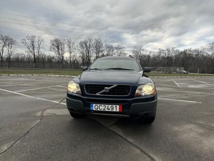 Синий Вольво ХС90, объемом двигателя 2.4 л и пробегом 270 тыс. км за 5300 $, фото 1 на Automoto.ua