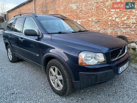 Синий Вольво ХС90, объемом двигателя 2.4 л и пробегом 265 тыс. км за 5300 $, фото 1 на Automoto.ua