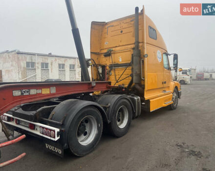 Желтый Вольво VNL 660, объемом двигателя 12.1 л и пробегом 1000 тыс. км за 25500 $, фото 24 на Automoto.ua