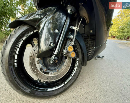 Черный Ямаха Т-макс, объемом двигателя 0.5 л и пробегом 19 тыс. км за 5999 $, фото 21 на Automoto.ua